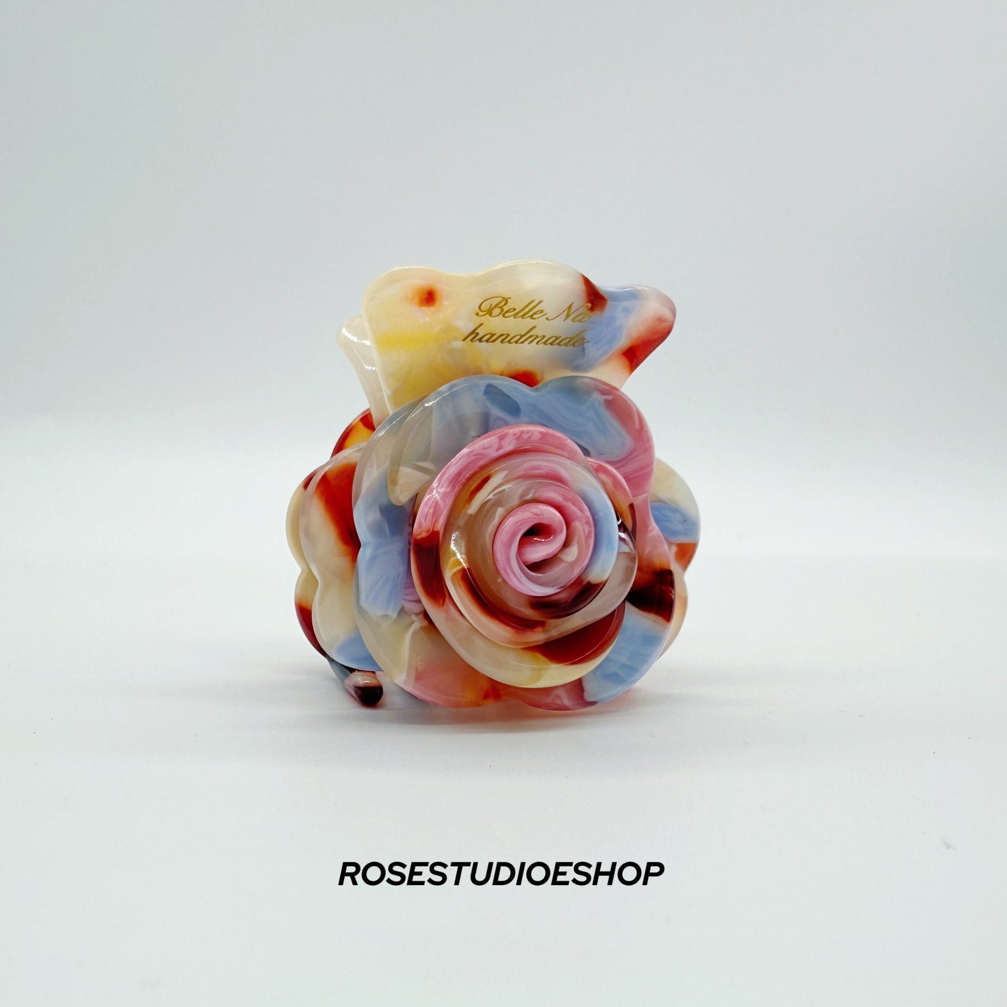 Middelgrote acetaat haarclip met roos