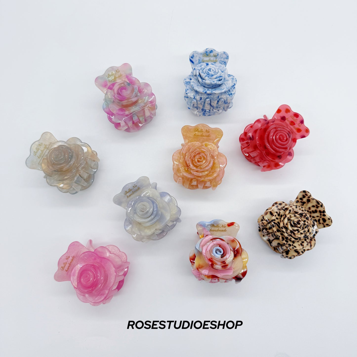 Middelgrote acetaat haarclip met roos