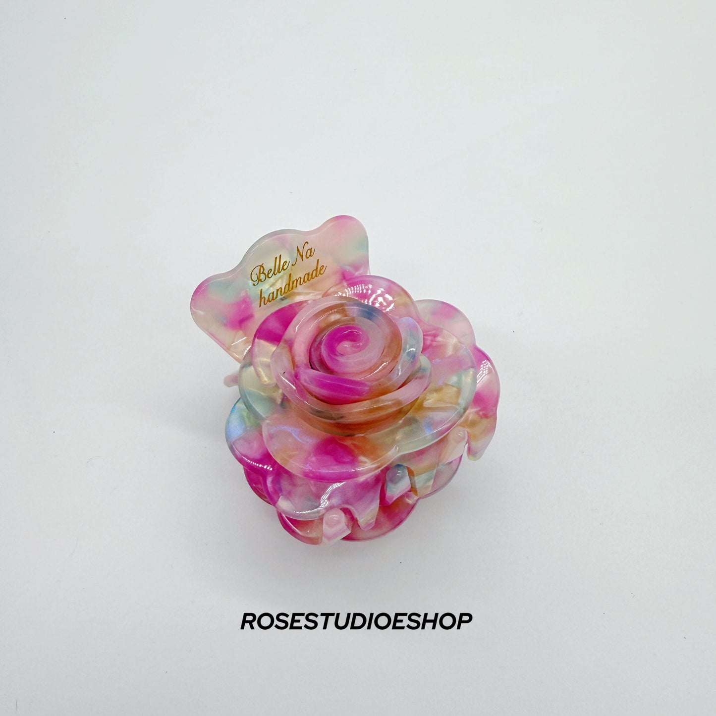 Middelgrote acetaat haarclip met roos